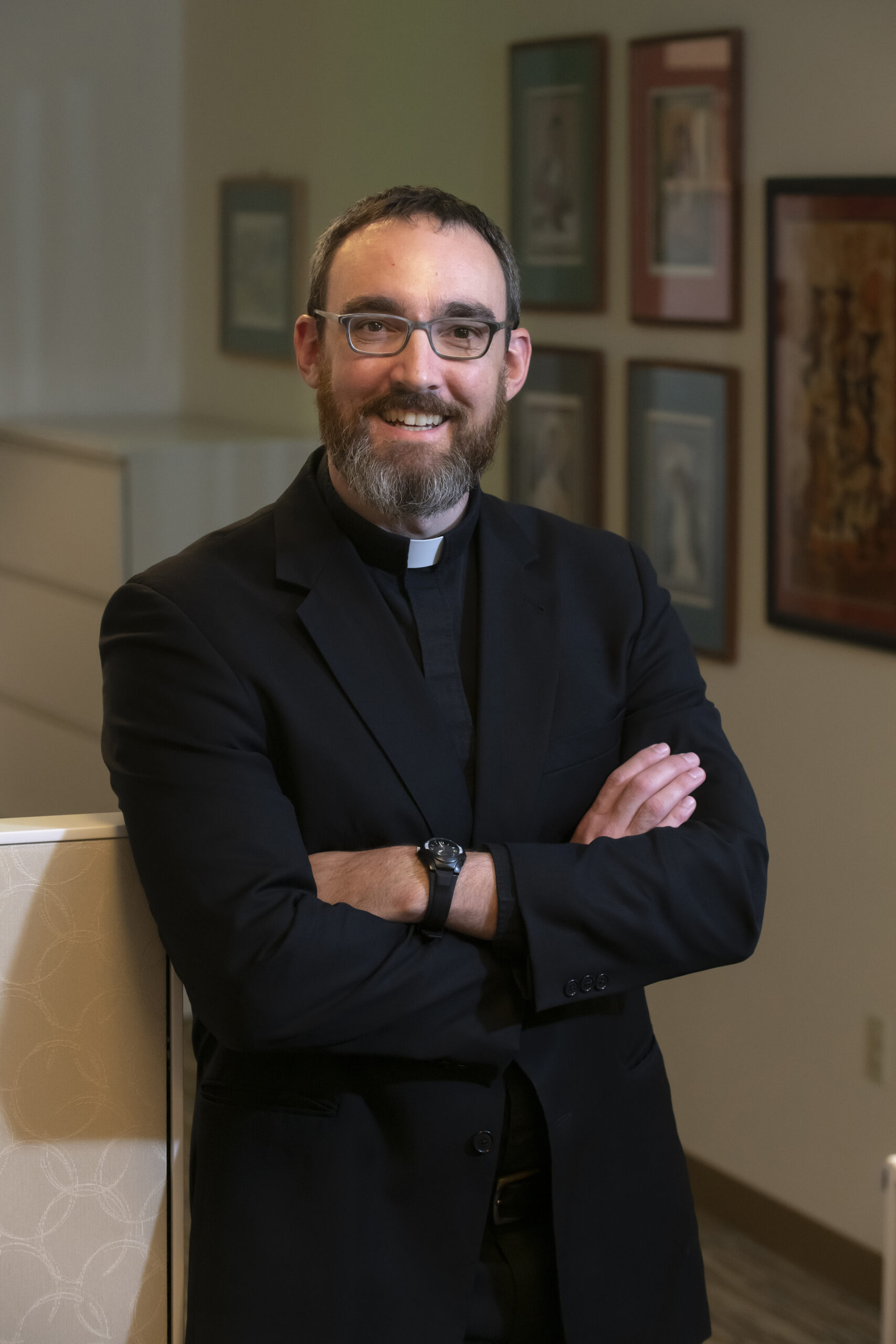 Michael Magree SJ, newly appointed Assist. Prof. (Theology) photographed in the Theology Dept. in Stokes for a future issue of Chronicle.